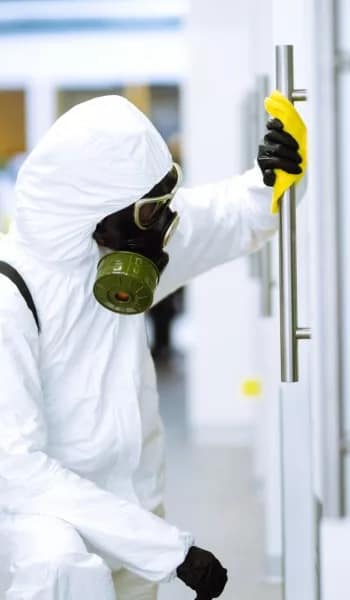 Certified Modern Disinfecting Technology & Sanitary Services Disinfecting Service Thumbnail - A Sanitary Specialist Disinfecting a Door Handle